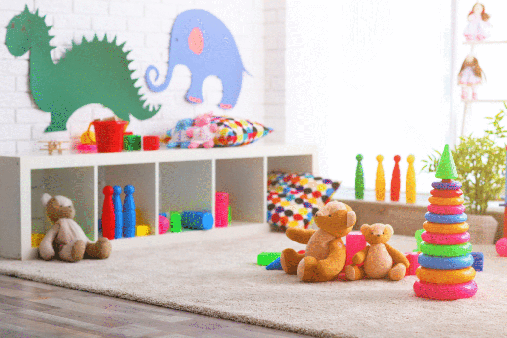 Fun, organized play area in a small space with toys neatly stored on white cube shelving.